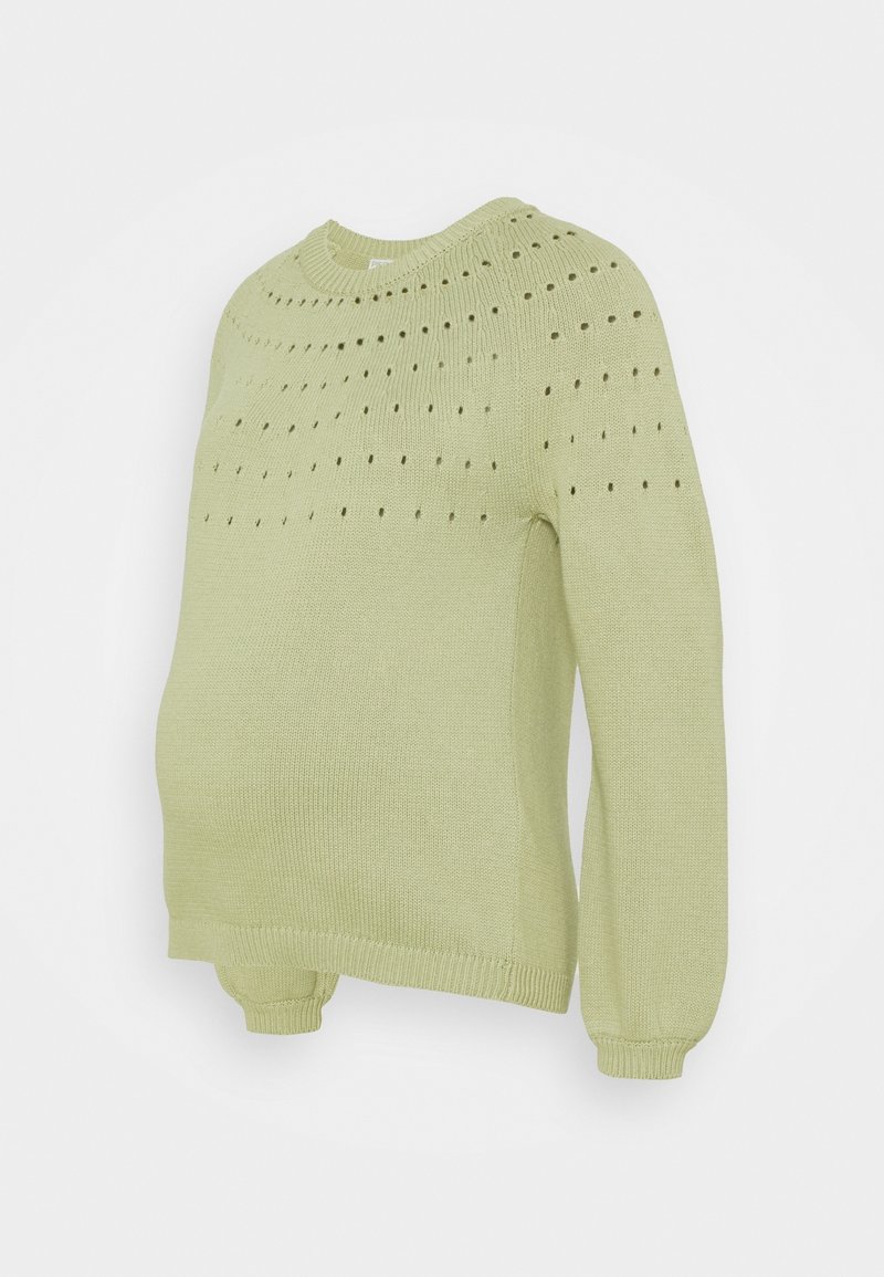 Pull en maille de couleur vert clair avec des trous décoratifs, col rond et manches longues. Doté d'un tissu texturé et de poignets ajustés.