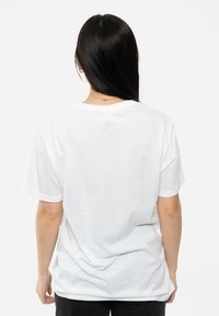 Paradiso Clothing FOO FIGHTERS ROXY FLYER UNISEX - Print T-shirt - white