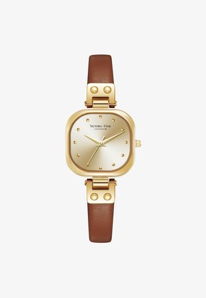 Montre carrée dorée avec cadran minimaliste, index des heures en points dorés, et bracelet en cuir marron, marque Victoria Hyde London.