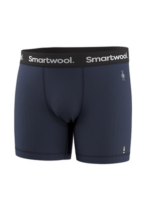 Marineblauwe Smartwool boxershorts met een zwarte tailleband met het witte Smartwool-logo en een klein kleurrijk label bij de zoom.