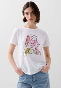 White cotton T-shirt with a colorful skull and crossbones graphic, featuring pink, yellow, and black details, round neckline, and short sleeves.
