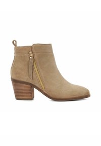 Beige suede ankle boot with a pointed toe, side gold zipper, and a stacked brown heel. Smooth texture and clean design.