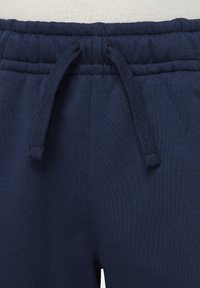 Nike Sportswear CLUB PANT UNISEX - Verryttelyhousut - midnight navy/midnight navy/(white)