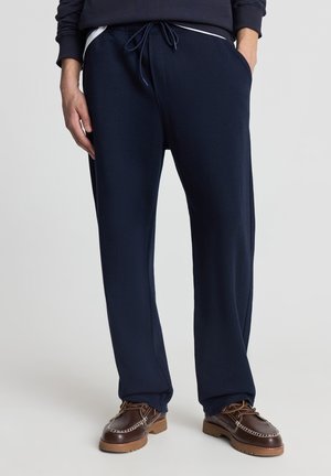 - Spodnie treningowe