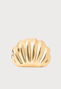 Gold shell-shaped hair clip with ridged texture; glossy finish highlights curves and folds. Compact design suitable for securing hair.
