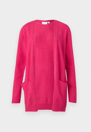 Roosa kardigan pikkade varrukatega, avatud ees ja kahe läbilõike taskuga. Pehme tekstuur ning sooniku äär ja varrukad. Lihtne, kaunistuseta disain.