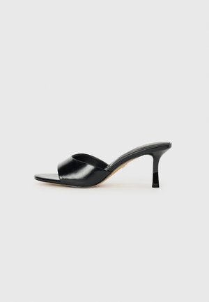 ANNABERAEN - Heeled mules - black