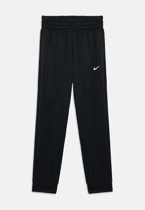 Pantalons de sport noirs avec ceinture élastique, poignets fuselés et logo Nike blanc sur la jambe gauche. Tissu lisse et léger.