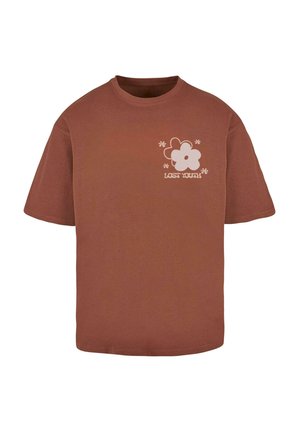 Brown cotton t-shirt with a loose fit, featuring a white flower graphic and "LOST YOUTH" text on the left side. Short sleeves, round neckline.