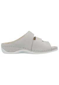 Beige leather slip-on shoe with an open toe design, featuring two cutouts, stitched detailing, and a white rubber sole.