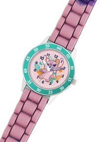 Mehrfarbige Uhr mit pinkem Gummiarmband und silberner Hardware. Das runde Ziffernblatt zeigt einen verspielten Charakter vor einem blumigen Hintergrund.