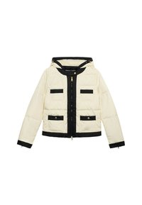 Cream puffer jacket with a black zip, hood, and pocket accents. Features a quilted texture, gold zipper, and contrasting black trim.