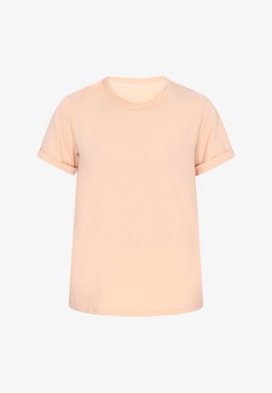 Lyse ferskenfarvet kortærmet bomuld T-shirt med rund hals og opkørte manchetter, vist på hvid baggrund.