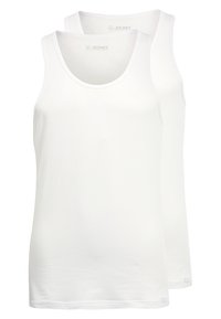 Dwa białe bawełniane topy na ramiączkach z dekoltem w serek, bezszwowymi pachami i prostym dołem. Tkanina wydaje się gładka i lekka.