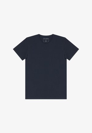 Granatowa dopasowana koszulka wykonana z bawełny, z krótkim rękawem i okrągłym dekoltem. Prosty design bez widocznych wzorów czy zdobień.