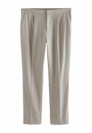 Beige Hosen aus glattem Stoff, mit entspannter Passform, gefalteter Vorderseite, elastischem Bund und Seitentaschen.