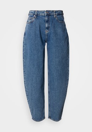 Hele sinine, kõrge vöökohaga paksud teksapüksid, mis on lõdva istuvusega, viie tasku, vööaasade ja sirgete säärtega, mille äär on natuke kulunud.