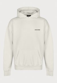 Felpa crema con tasca frontale, cappuccio regolabile con lacci e un piccolo logo nero "PEGADOR" sul lato sinistro del petto. Design semplice e casual.