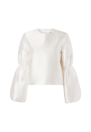 Valkoinen satiinipusero pyöreällä pääntiellä ja näyttävillä, kimmoisilla, kyynärpäissä kerätyillä pitkissä hihoissa.