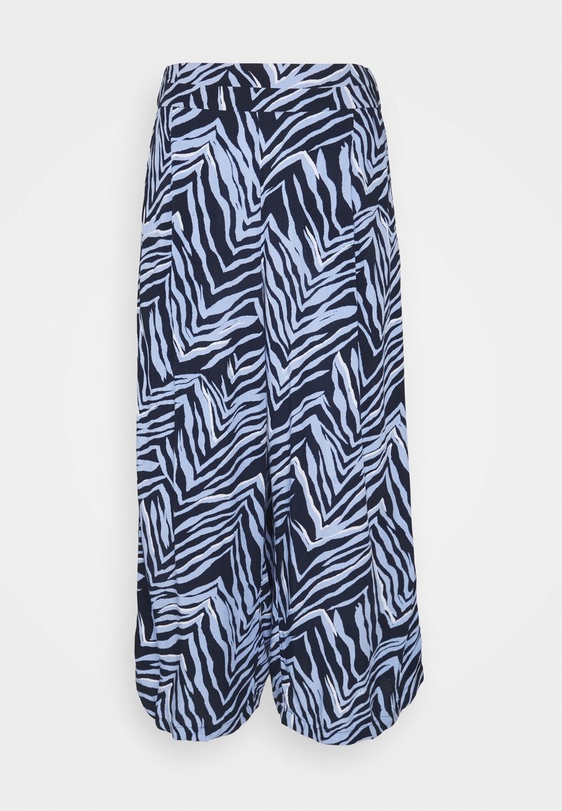 Pantalon ample à jambes larges, avec un motif abstrait audacieux de rayures zèbre bleu marine et bleu clair.