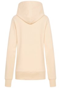 Felpa con cappuccio color beige chiaro in tessuto morbido, con maniche lunghe e polsini e orlo a coste. La vista posteriore rivela un design senza cuciture.
