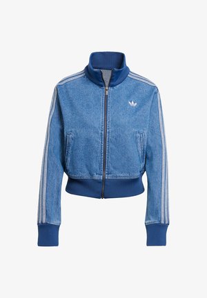 Sinine denimpit vest, kõrge kaeluse, soonikute mansettide ja allosa ning kolme valge triibuga varrukatel. Adidas logo rinnal.