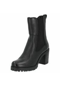 Black leather ankle boot with elastic side panels, chunky heel, and textured rubber sole. Features smooth upper and rugged tread for grip.
