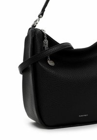 Black leather handbag with a textured finish, a single shoulder strap, and a silver hardware accent. The brand name is embossed on the front.