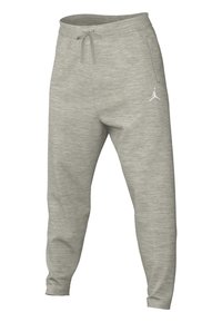 Lys grå joggerbukser lavet af tekstureret stof, med tapered ben, elastisk talje med snøre og et hvidt logo på siden.