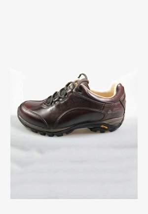 Braune Leder-Wanderschuhe mit schwarzem Gummi-Außensohle, robuster Bauweise, Schnürdesign und gepolstertem Innenbereich für Komfort.