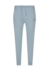 Pantalons de jogging bleu clair en matériau doux, dotés d'une taille élastique avec cordon de serrage et de poignets ajustés aux chevilles.