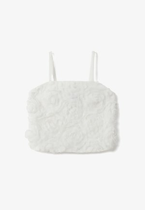 White crop top with thin straps and textured 3D floral fabric design.