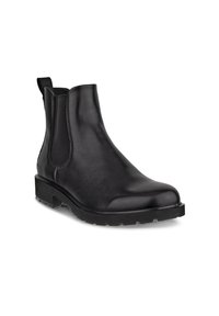 Botas Chelsea de cuero negro con una superficie lisa, paneles laterales elásticos, tira de agarre y una suela de goma gruesa para mejorar la tracción.