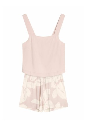 Jasnoróżowa bluzka bez rękawów, zestawiona z szortami w kwiatowy wzór w delikatnych odcieniach. Szorty mają elastyczny pas. Miękka tekstura materiału.