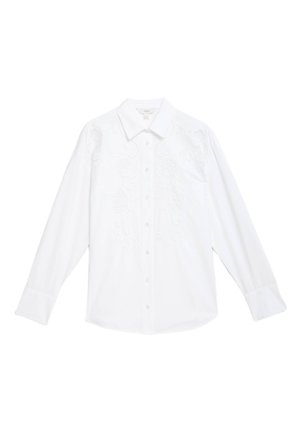 Camicia bianca a maniche lunghe realizzata in tessuto morbido, con ricami dettagliati sulla parte anteriore, colletto classico e chiusura con bottoni.