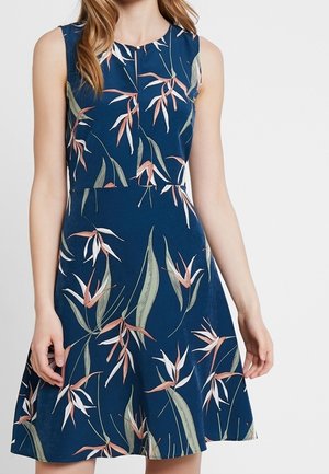 Ärmelloses marineblaues Kleid mit pinkem und weißem tropischem Blumenmuster, tailliert und mit knielangem ausgestelltem Rock.