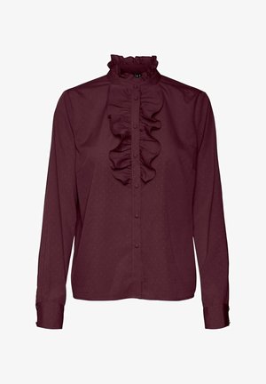 Donkerpaarse blouse met lange mouwen, een gerimpelde hoge kraag en een knoopsluiting aan de voorkant met centrale ruches.