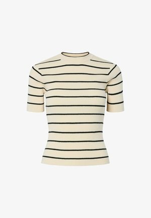 Krāsots adījuma īsām piedurknēm krekls krēmbaltā krāsā ar melnām horizontālām svītrām; tam ir apaļš kakla izgriezums un pieguloša silueta.