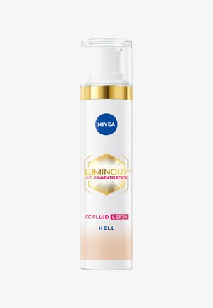 NIVEA Luminous CC Fluid, white cylindrical bottle, gold accents, clear pump dispenser, text includes "LSF30" and "ANTI-PIGMENTFLECKEN."