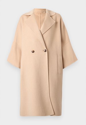 Μπεζ παλτό από μάλλινο μείγμα με διπλό πέτο, μεγάλα πέτα, κοντά μανίκια και μία τσέπη στο μπροστινό μέρος. Μαλακή υφή.