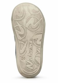 Suola in gomma chiara con una superficie testurizzata, caratterizzata da motivi a logo circolari e un marchio in rilievo.