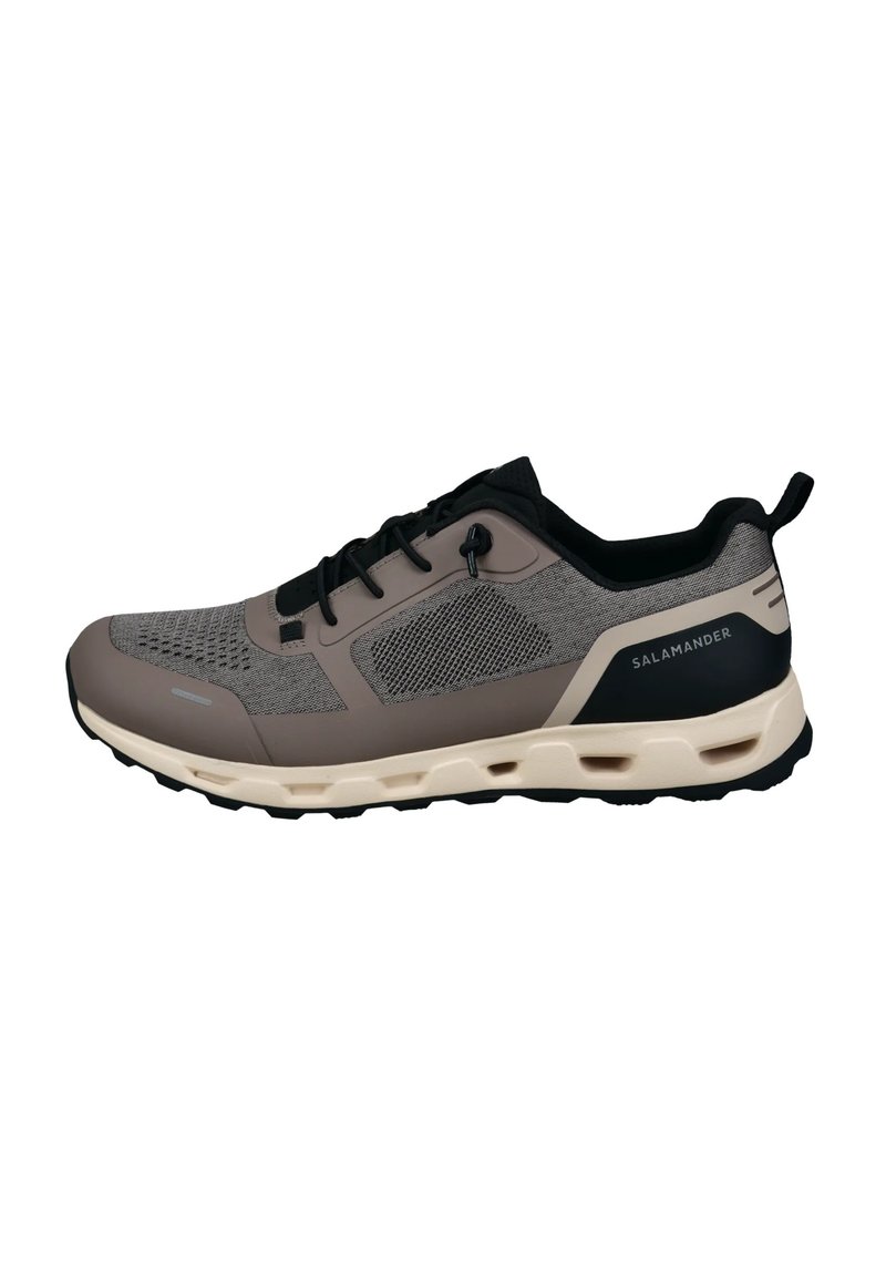 Sport sneakers with a gray mesh upper, black accents, and a lightweight beige sole. Features a lace-up design and logo on the side.