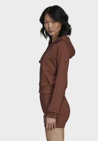 adidas Originals Športna jopa s kapuco na zadrgo - brown