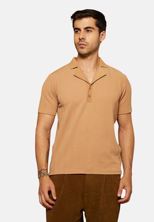 - Koszulka polo