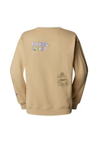 Beige sweatshirt med rund halsringning, med flerfärgad text "EXPLORERS GATHER" och svart grafik av en van på den nedre högra ärmen.