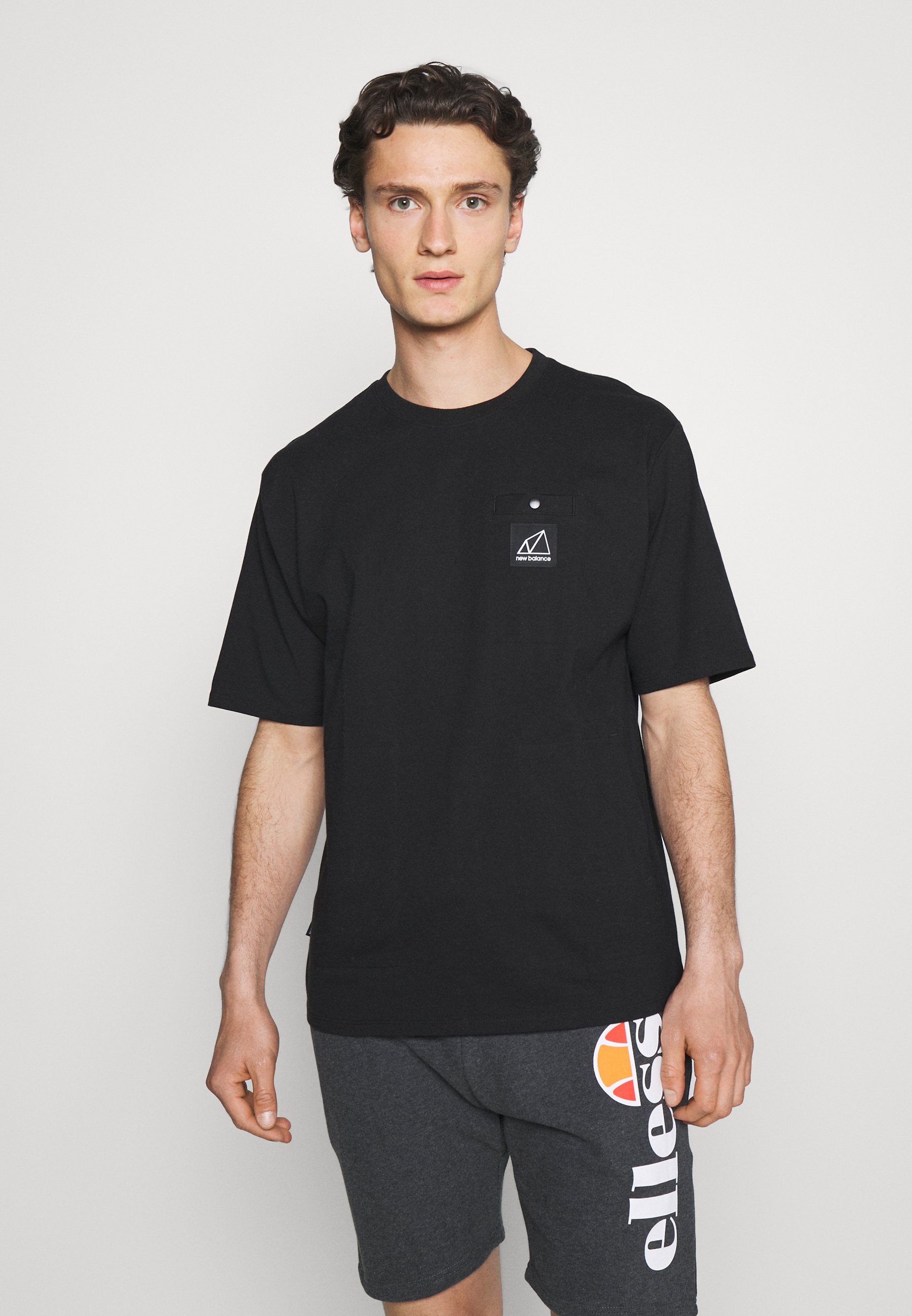 New Balance ALL TERRAIN POCKET TEE 