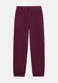 Burgunderfargede joggebukser med elastisk midje og innsnevret ankel. Glatt tekstur uten synlige mønstre eller detaljer.