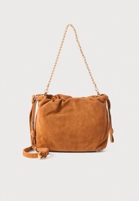 Brown suede shoulder bag with a gathered design, gold-tone chain strap, side knots, and a removable, adjustable strap.