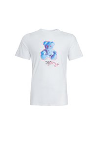 White cotton t-shirt featuring a blue bear graphic with red accents and text. Round neck, short sleeves, and a relaxed fit.