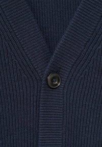 Navy blue knit cardigan featuring a V-neck, ribbed texture, and a single black button closure at the front.